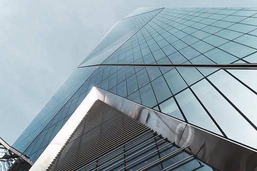 Glass and metal cladding meeting at an angle