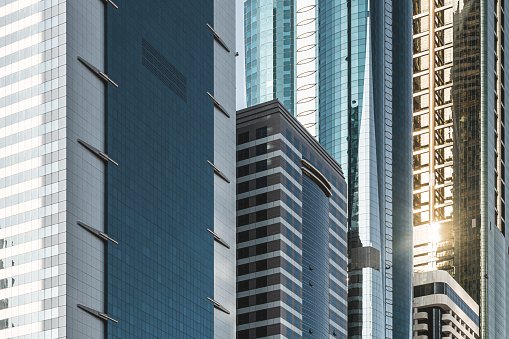 Glass facades of towers in Downtown Dubai
